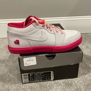 Size 6 white & pink youth air Jordan’s. Reflective